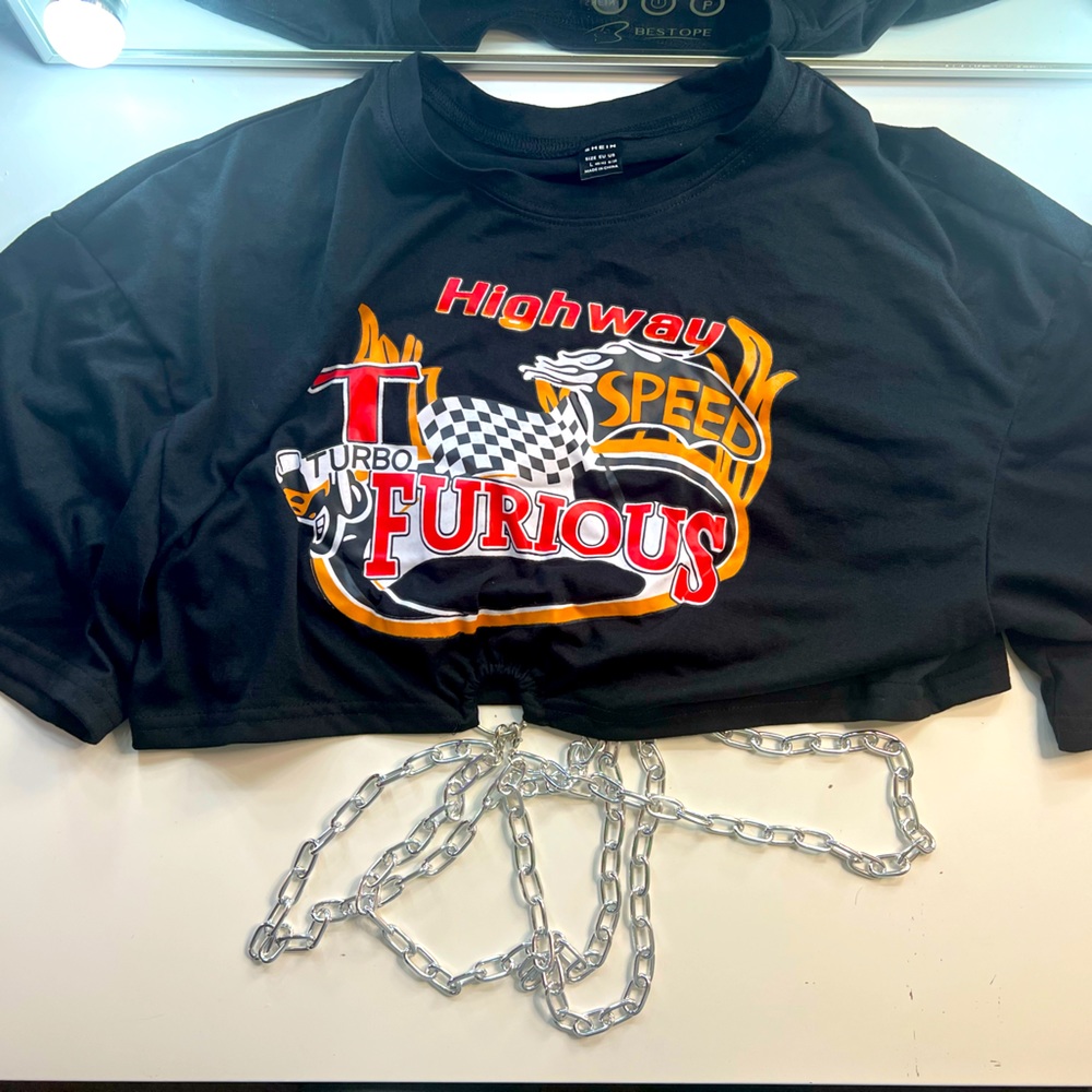 Brand new crop top with chain around waist.